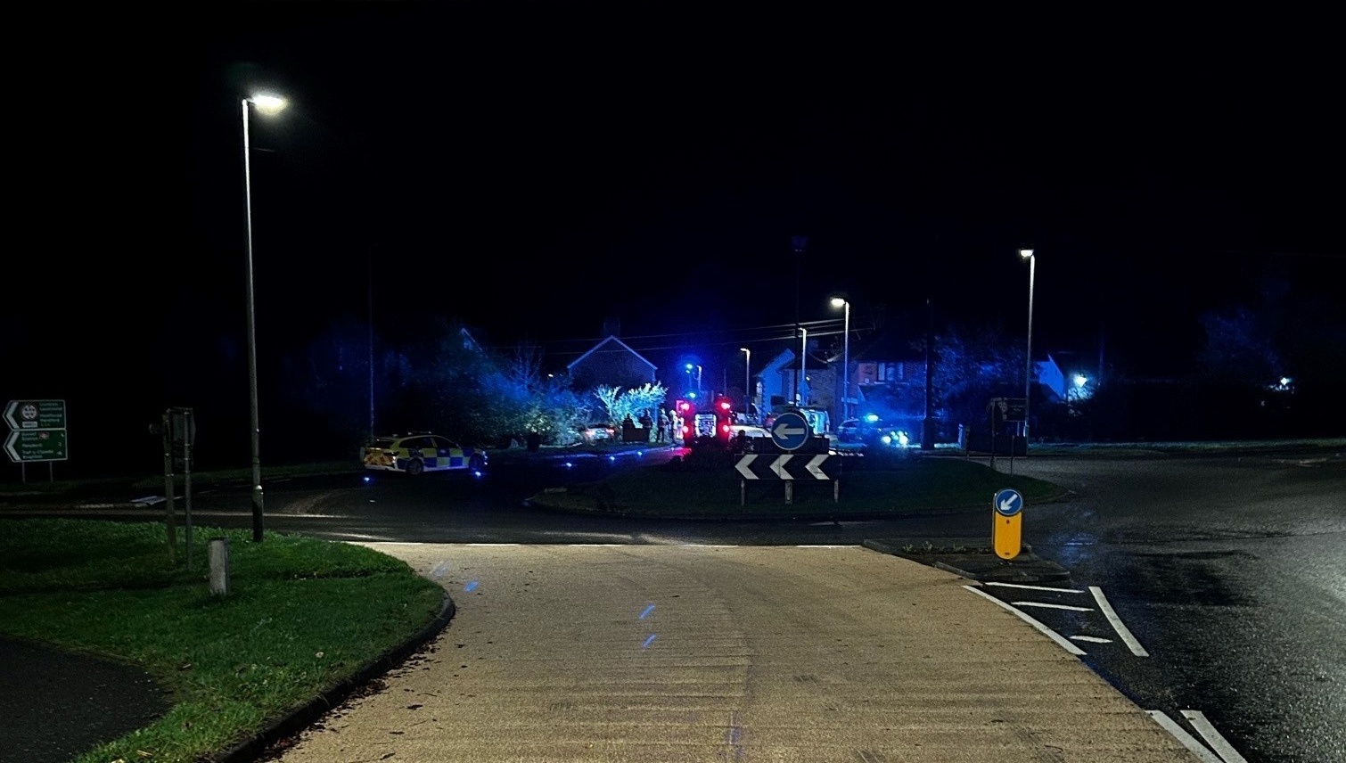 Emergency services at Crossgates roundabout after an Audi driver crashed into a hedge during a high-speed chase. Picture by Powys Roads Policing/Dyfed-Powys Police