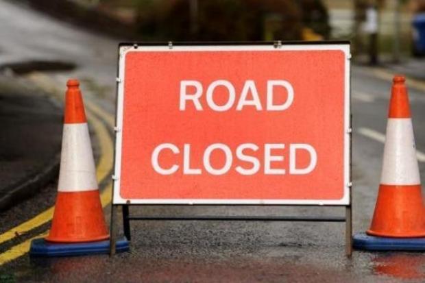 The B4569 between Caersws and Trefeglwys is blocked following the incident.