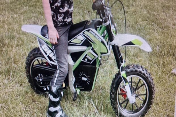 The green, black and white XTM pro-rider dirt bike was stolen in Llandrindod Wells.