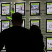 People looking at the signs in an estate agent's window.PRESS ASSOCIATION Photo. Pic: Yui Mok/PA Wire.