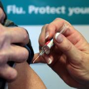 Over 24,000 eligible Powys residents have yet to take their free vaccine.
