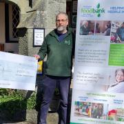 The Community Angels group donating funds to Welshpool Foodbank