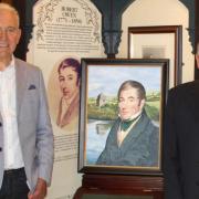 Artist Brian Jones with Robert Owen Museum chairman Rex Shayler. Picture by Andy Newham.