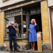 The Duchess of Cornwall leaves the Murder and Mayhem bookstore during a visit to Hay-on-Wye. Jacob King/PA Wire