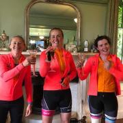 Rachel, Kate and Tabitha sip a well-earned beverage after finishing