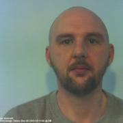 Michael Kenneth Evans is wanted in connection with burglaries and quad bike thefts in Powys