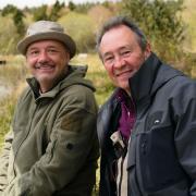 Undated BBC Handout Photo from Mortimer & Whitehouse: Gone Fishing. Pictured: Bob Mortimer, Paul Whitehouse Llyn Gwyn Lake, Wales. PA Feature SHOWBIZ TV Gone Fishing. Picture credit should read: PA Photo/BBC/Owl Power/Sam Gibson. WARNING: This