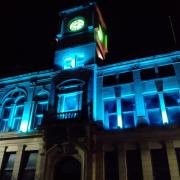 Welshpool Town Hall lit in blue and yellow in solidarity with the people of Ukraine