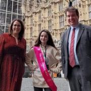 Newtown's Miss Junior Teen GB finalist Scarlett Davies with Brecon and Radnorshire MP Fay Jones and Montgomeryshire MP Craig Williams outside the Houses of Parliament and Big Ben