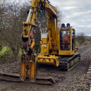 A digger working on the Cambrian Line after recent flood damage near Welshpool. Pic: Network Rail.