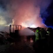 Five crews tackled the barn fire on the Wales/England border