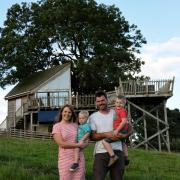 John and Laura Lewis, pictured with sons Bertie and Charlie, at the Squirrels Nest on their Nantygelli Farm, Llanbister. Pic credit Ruth Rees