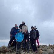 Gemma Bradford, Karon Duggan, Anna Jones, Carl Watkins, Martin Stevens, Beth James and Sarah Griffiths at the summit of Cadair Idris