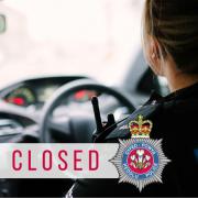 Dyfed-Powys Police have closed a road near Presteigne after a crash