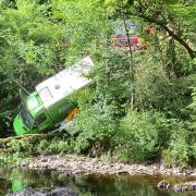 An Asda delivery van driver was rescued by emergency services from a steep embankment near the River Banwy in Llanfair Caereinion on Wednesday, June 15, 2022. Picture by Alan Webster.