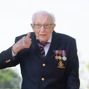 File photo dated 16/04/2020 of the then 99-year-old war veteran Captain Tom Moore at his home in Marston Moretaine, Bedfordshire, after he achieved his goal of 100 laps of his garden.
