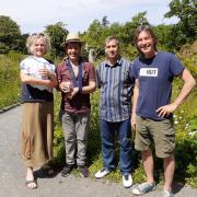 Mayor Jeremy Paige with volunteers at the community gardens in Machynlleth