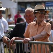 Princess Anne is all smiles despite the scorching temperatures at the Royal Welsh on Tuesday