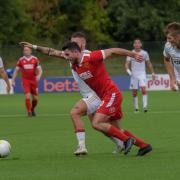 OSWESTRY, ENGLAND 28 July 2022: Newtown's Louis Robles battles during the UEFA Europa Conference League Second qualifying round fixture between Newtown AFC and FC Spartak Trnava, Park Hall, Oswestry, England, 28 July. (Pic By Will Cheshire/FAW).