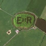 A view from above of the tribute to Queen Elizabeth II's coronation on at Beacon Ring hillfort.