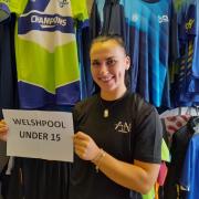 Adele Nicoll after selecting Welshpool Town Under 15s for a new kit.