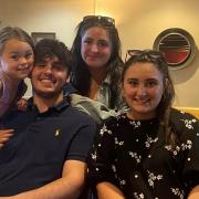 Dylan seen here with his niece Azaylia and sisters Izzy and Olivia. Picture: West Mercia Police