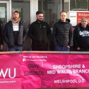 The picket line outside Welshpool Post Office, featuring strkiing Royal mail staff and Town Councillor David France.