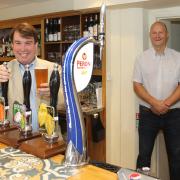 Craig Williams MP is looking for nominations for the best pub and the best shop in Montgomeryshire.
Pictured is Craig Williams MP for Montgomeryshire pulling a pint at  the Royal Oak Hotel in Welshpool with General Manager Chris Birdsell-Jones