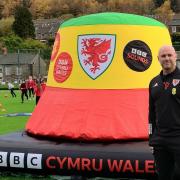 Wales manager Rob Page with the inflatable bucket hat.