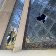 Stained glass windows were broken at St Llwchaiarn's Church near Newtown