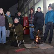 Royal Mail postal workers in Welshpool brave the -5° temperatures this morning as they start a two day strike today and Thursday 15th December 2022, pictured are some of the workers keeping warm outside Welshpool delivery office.Picture by Phil Blagg