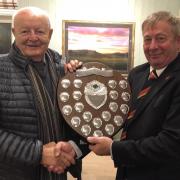John Saer (left) pictured receiving the Brecon and Radnor County Golf Union Handicap League for 2018 on behalf of Builth Wells Golf Club. Pic: Builth Wells Golf Club