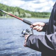 A father and son have been fined for illegal fishing in Powys