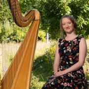 Alis Huws with the Royal harp.