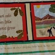 Pupils and staff at Ysgol Cedewain in Newtown made a quilt to mark the retirement of a former headteacher.