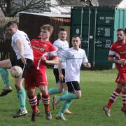 Action from Llanidloes Town's clash at Chirk AAA. Picture by Brian Prydden.