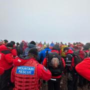 More than 40 walkers ascended Pen-y-Fan on Monday, May 1, to pay tribute to a mountain rescue team member who had died while rescuing someone 40 years earlier
