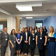 The Dyfi Valley Health team, with Dr Bradbury-Willis back right, are pictured in their new home.