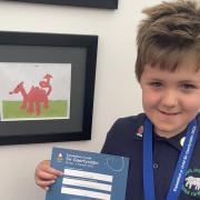 Huw Elias with his third place award from this year's Urdd Eisteddfod