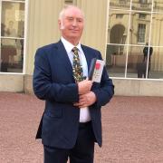 Tom Evans collects his MBE in 2020 at Buckingham Palace for services to farming heritage. Pic: Amanda Thomas