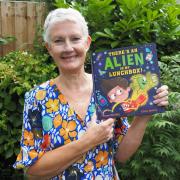 Tessa Gearing with her debut picture book 'There's an Alien in my Lunchbox'