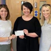 Ceri Jones and Caroline Jones, who helped organise the Carno Show charity lunch, paid a visit to the chemotherapy ward to present a cheque to Dr Elin Jones who has been spearheading a new cancer unit at Bronglais Hospital in Aberystwyth