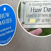 The blue plaque installed for Huw Davies, described as a 