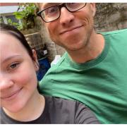 Russell Howard with Sam Cook, a member of staff at the Little Devil's Cafe in Aberystwyth