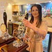 Leeanne Rogers pulls a pint of popular Butty Bach at The Sarn Inn