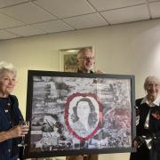 Builth mayor Mark Hammond with the picture of Violette Szabo. Her daughter Tania was also present along with Cllr Alison Lewis