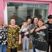 Sian Williams, owner of Barks and Bubbles Dog Grooming, with her family and freinds who have helped move her into Welshpool.