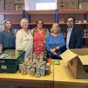 Our Communities Together has supported Raven House Trust. L-R, Community Foundation Wales' Katy Hales, Raven House Trust foodbank coordinator Samantha Harrhy, finance manager Becca Jevons, volunteer Gill Passey and Newsquest's Gavin Thompson
