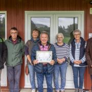 The Dolwen Field development committee celebrate the ‘outstanding’ status awarded in the RHS sponsored It’s my Neighbourhood Awards category.
