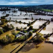 Flooded fields in Llandrinio, Powys after Storm Babet battered the UK, causing widespread flooding